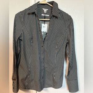 Brand new Calvin Klein Shirt. This is a woman shirt brand new with tag.